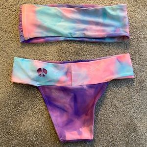 Tie dye bathing suit with cutout peace sign